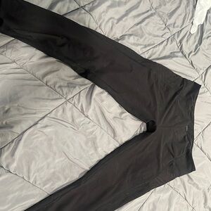 Z by Zobha black leggings with design on the size as well as zipper on both legs
